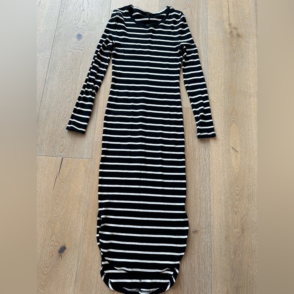 Black and white striped form fitting dress. Great condition!
